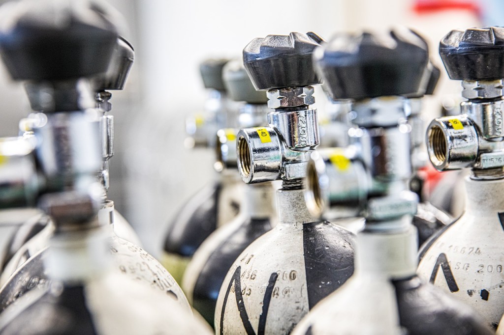 A row of medical grade oxygen bottles for paramedics to use on ambulances. 