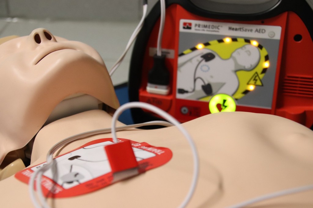 a practice mannequin attached to a paramedic's AED. 