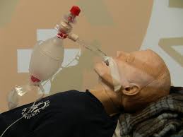 Securing device used on a mannequin with an IGel and BVM.